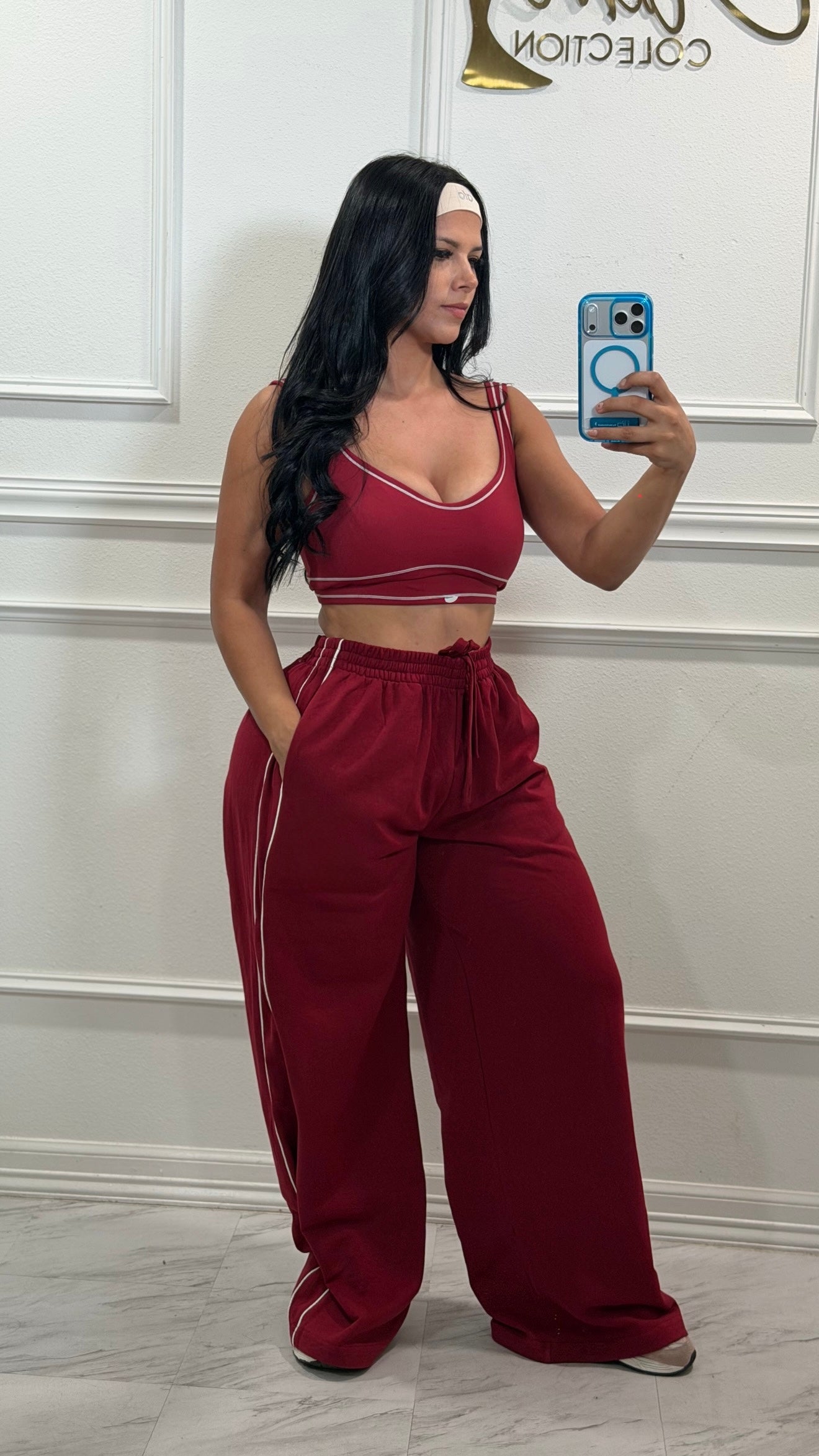 Burgundy pants and sport bra